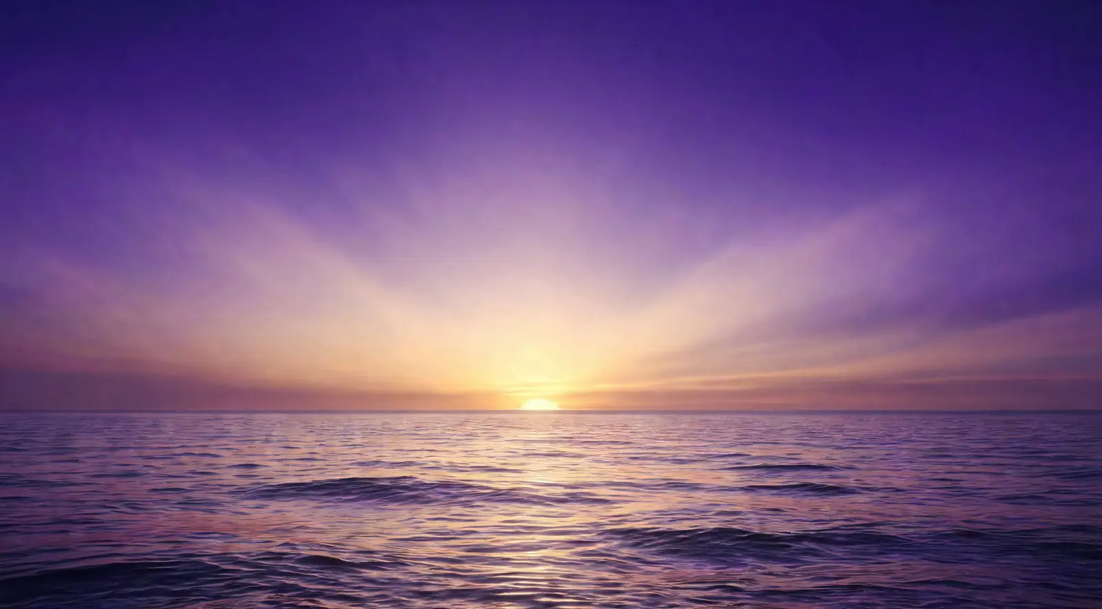 Sunrise over a calm horizon